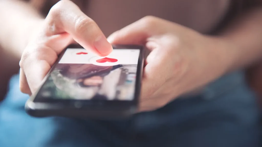 A Person'S Hand Touching A Phone