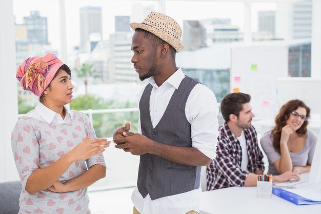 Activities2F1742475493955 Serious Coworkers Standing Interacting 13339 187365 Fkw14P.tmp